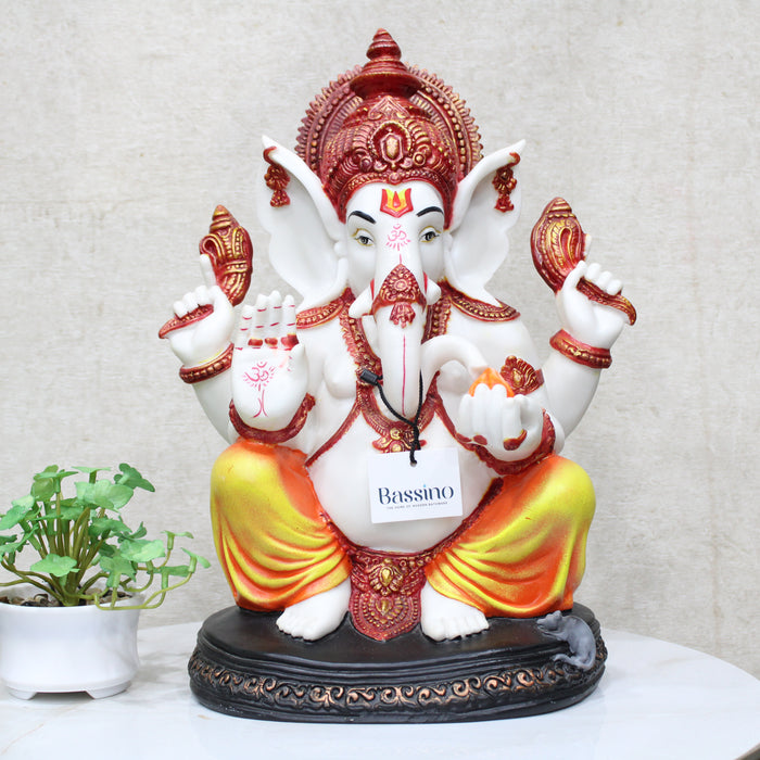 BASSINO Colorful Lord Ganesha seating Idol for home and office