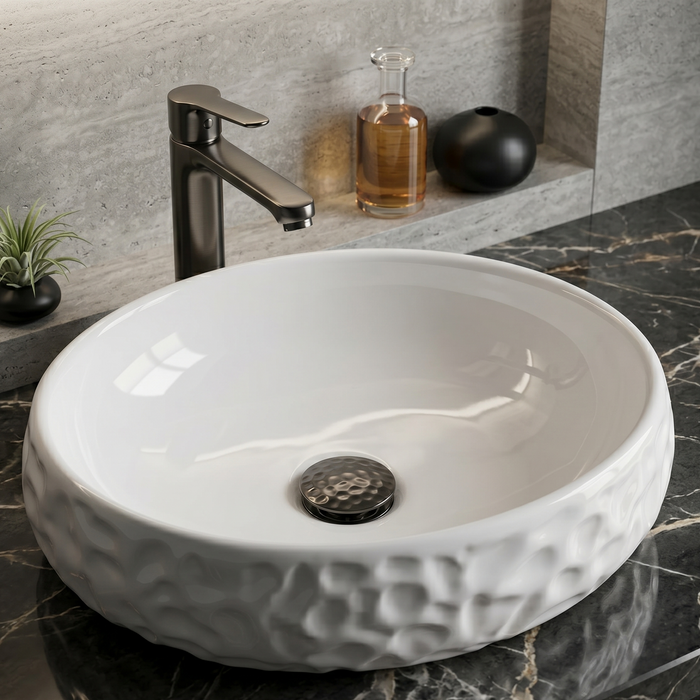 Bassino Textured Oval Countertop Wash Basin (19" x 13" x 5.5") – Modern Ceramic Sink with Sculpted Exterior Design