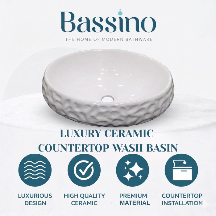 Bassino Textured Oval Countertop Wash Basin (19" x 13" x 5.5") – Modern Ceramic Sink with Sculpted Exterior Design