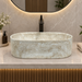 600x380x150 mm beige artificial stone table top wash basin with matte natural stone finish, rounded rectangular countertop basin for modern luxury bathroom.