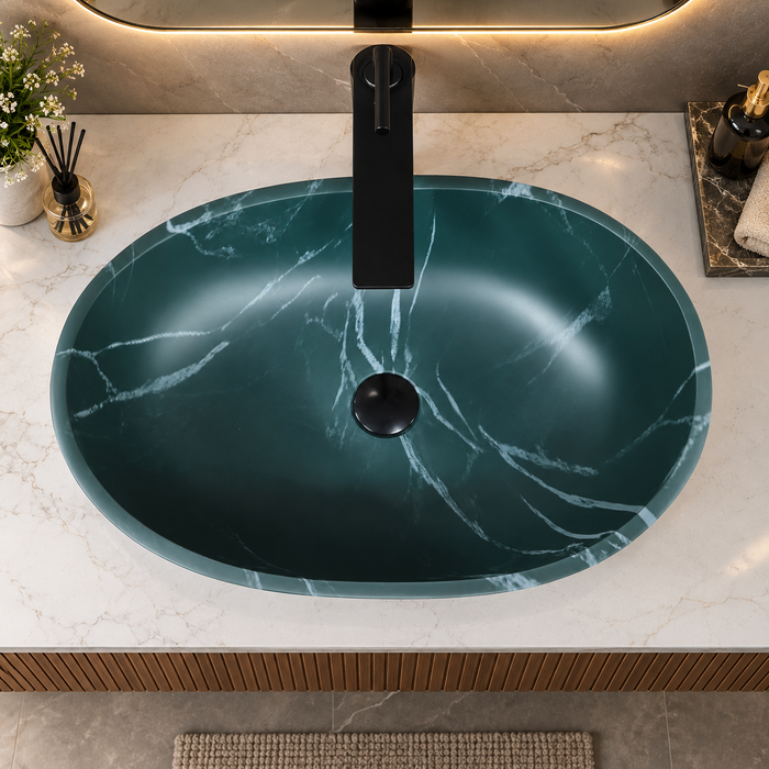 600x380x200 mm deep green artificial stone table top wash basin with matte finish, white marble-style veining and sculpted oval design for modern luxury bathrooms.