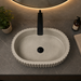 Bassino beige fluted table top wash basin 485 × 355 × 135 mm with textured ribbed design for modern luxury bathroom countertops.