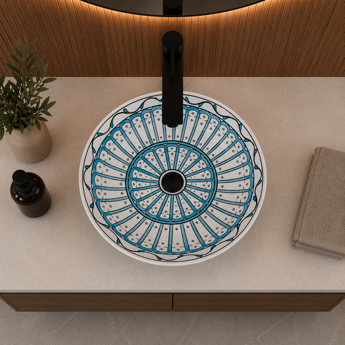 Bassino handmade ceramic table top wash basin 400 × 400 × 120 mm with blue and white decorative pattern, round design and glossy finish for modern luxury bathrooms.