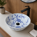 Bassino handmade ceramic table top wash basin 400 × 400 × 120 mm with blue floral pattern, white glossy finish and round countertop design for modern bathrooms.