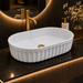 Bassino matte ceramic oval countertop wash basin in white, 550 × 355 × 150 mm
