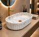 Bassino matte ceramic oval countertop wash basin with white marble finish, 550 × 355 × 150 mm