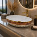 Bassino oval ceramic countertop wash basin with glossy white and gold decorative finish