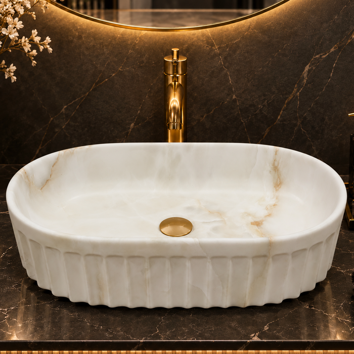 Bassino premium oval ceramic table top wash basin with matte ivory marble design