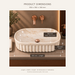 Beige marble ceramic table top wash basin with glossy finish, fluted exterior and elongated oval design, 550 × 350 × 150 mm.