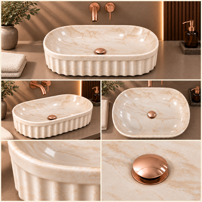 Beige marble ceramic table top wash basin with glossy finish, fluted exterior and elongated oval design, 550 × 350 × 150 mm.