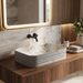Beige onyx marble pattern ceramic rectangular table top wash basin 460x325x125 mm with rounded corners and horizontal ribbed exterior.