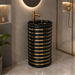Black and gold luxury floor standing pedestal wash basin with glossy cylindrical design, horizontal gold detailing and 440 × 440 × 820 mm size for modern bathrooms.