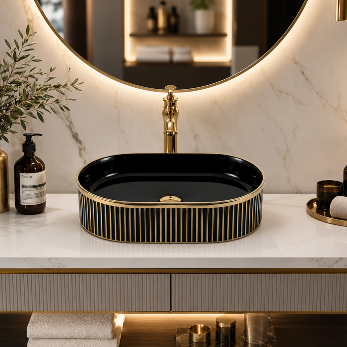 Black and gold luxury table top wash basin with glossy interior, vertical gold detailing and 490 × 320 × 150 mm size for modern bathroom countertops.