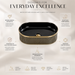 Black and gold luxury table top wash basin with glossy interior, vertical gold detailing and 490 × 320 × 150 mm size for modern bathroom countertops.