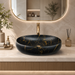 Black and gold marble pattern matte ceramic table top wash basin, 600x400x150 mm, for modern luxury bathrooms.