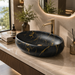 Black and gold marble pattern matte ceramic table top wash basin, 600x400x150 mm, for modern luxury bathrooms.