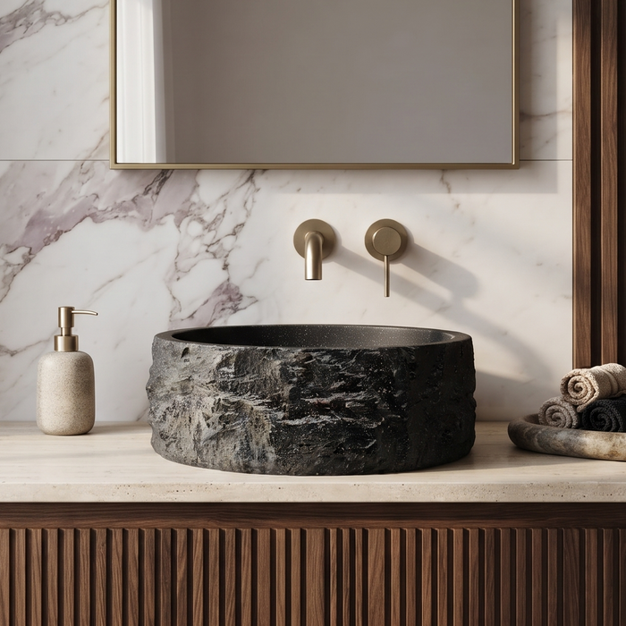 Black artificial stone table top wash basin with matte finish, round shape and raw rock-textured exterior, 400 × 400 × 140 mm.