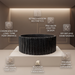 Black artificial stone table top wash basin with matte speckled finish, round shape and vertical fluted exterior, 390 × 390 × 150 mm.
