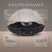Black artificial stone table top wash basin with organic free-form shape, rough rock-textured exterior and 490 × 370 × 140 mm size.