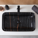 Black marble-look ceramic table top wash basin with gold and grey veins, glossy rectangular countertop basin measuring 750 × 400 × 140 mm for modern bathrooms.