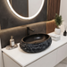 Black stone texture oval ceramic table top wash basin 500x375x150 mm with white marble veining and rough rock exterior for luxury bathrooms.