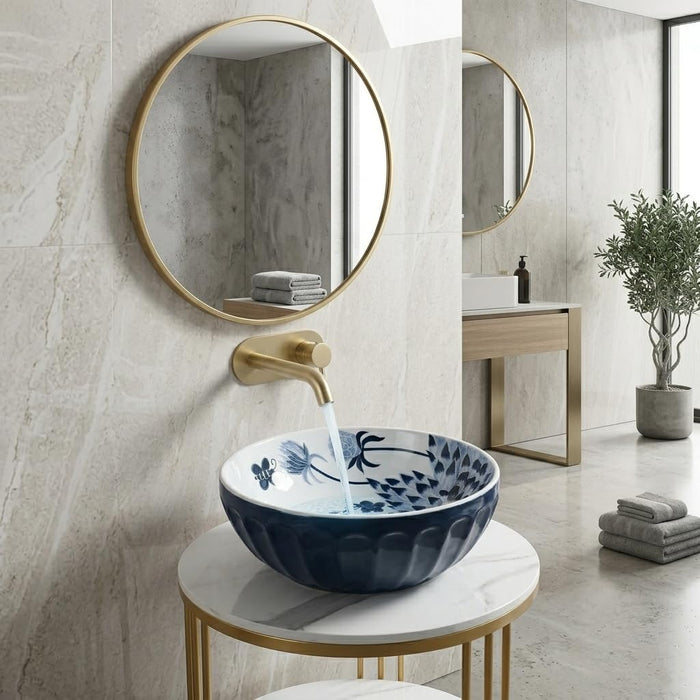 Blue and white floral round ceramic table top wash basin 375x375x125 mm with matte finish and sculpted fluted exterior design.