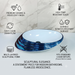 Blue and white glossy ceramic table top wash basin with oval layered design, 520 × 380 × 150 mm designer countertop basin for modern luxury bathrooms.