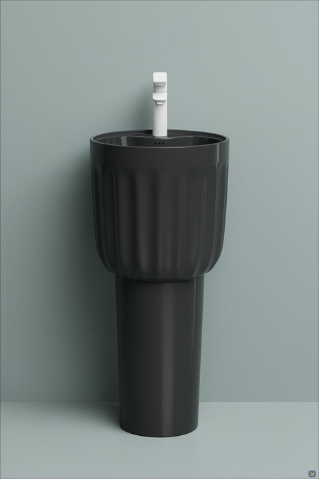 Black freestanding sink against a gray background