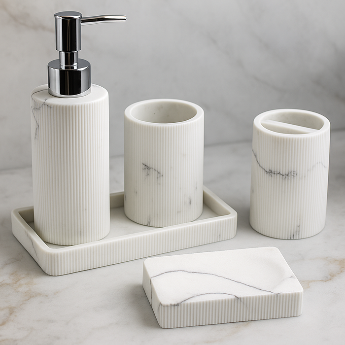 Marble-textured bathroom accessory set including a dispenser, two cups, and a soap dish on a neutral background.