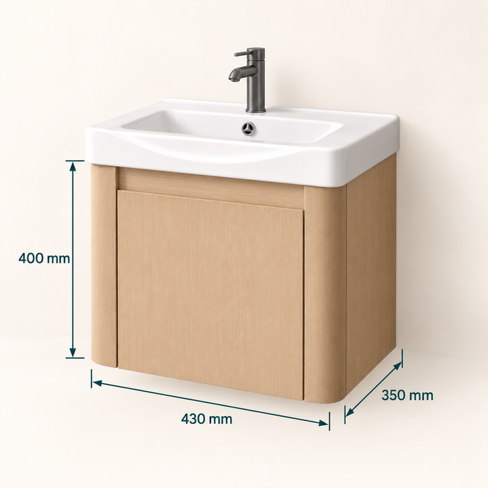 Compact light-wood wall-mounted bathroom vanity with integrated white basin and single-door storage
