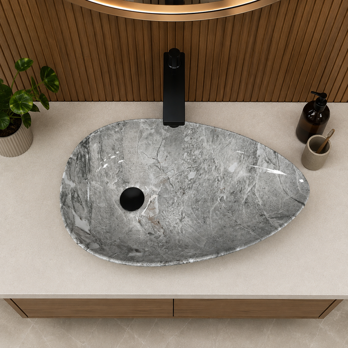 Designer grey and white marble pattern table top wash basin 560 × 355 × 130 mm with glossy finish and asymmetrical oval shape for modern luxury bathrooms.