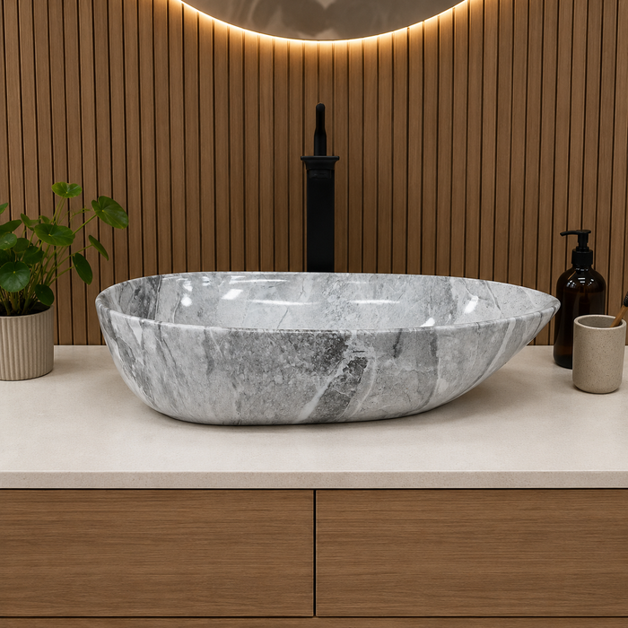 Designer grey and white marble pattern table top wash basin 560 × 355 × 130 mm with glossy finish and asymmetrical oval shape for modern luxury bathrooms.