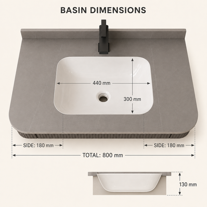 Floating grey bathroom vanity with two drawers, gold knobs and white basin