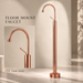 Glossy Rose gold floor mount basin faucet with tall curved spout and single lever handle, modern freestanding bathroom tap for luxury wash basin installations by Bassino.