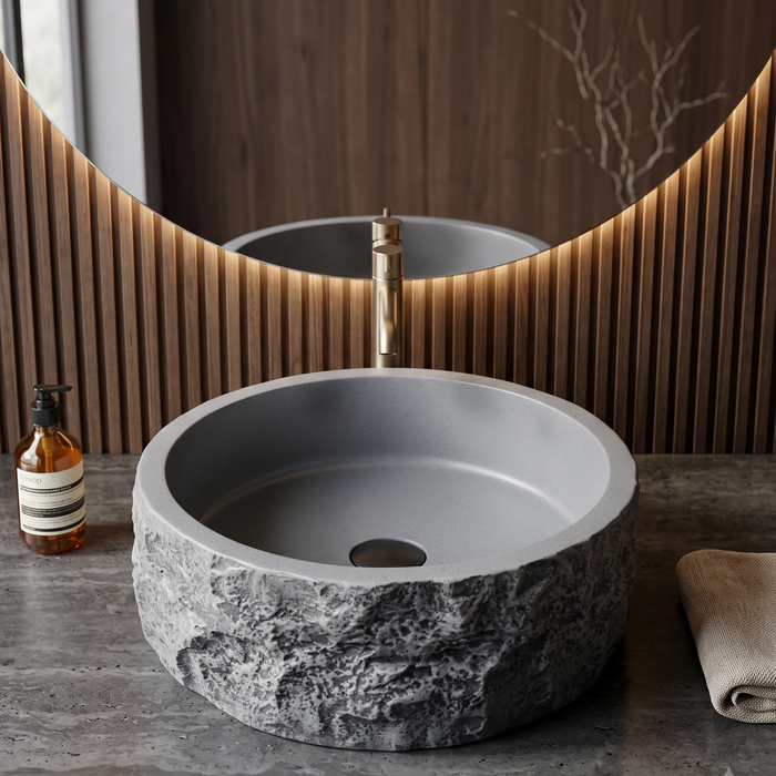 Grey artificial stone table top wash basin with matte finish, round shape and natural rock textured exterior, 400 × 400 × 140 mm.