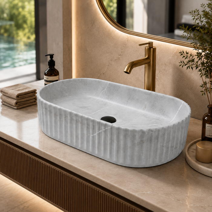 Grey marble fluted ceramic table top wash basin, 510x310x120 mm, with ribbed rounded rectangular design for modern bathrooms.