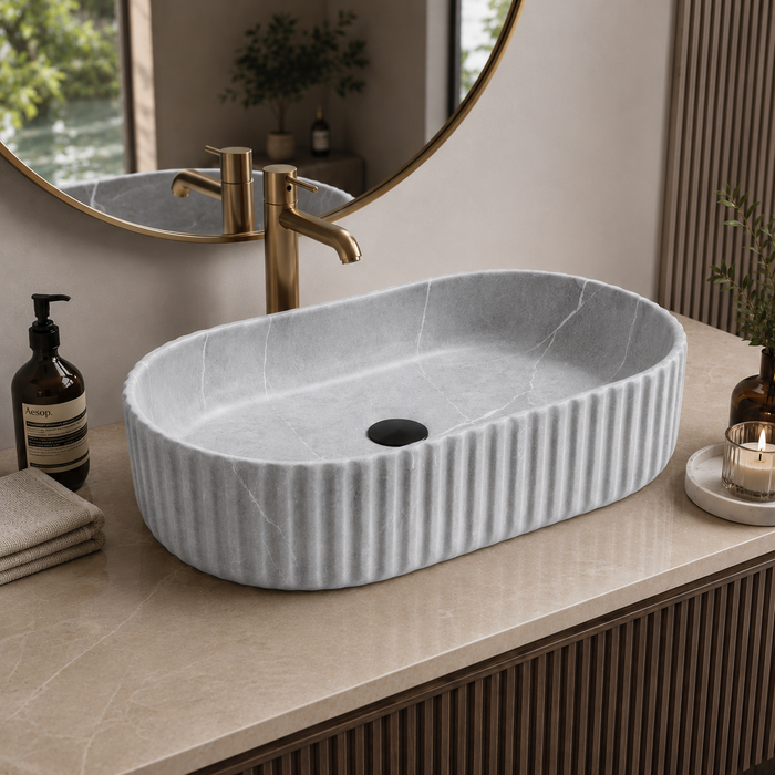 Grey marble fluted ceramic table top wash basin, 510x310x120 mm, with ribbed rounded rectangular design for modern bathrooms.