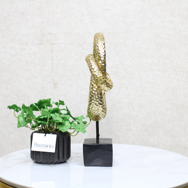 Gold Spiral Loop Sculpture, designed with a hammered-texture finish The abstract spiral form adds movement and dimension, making it an eye-catching accent for console tables, bookshelves, or office desks. BSP-8216 L 18 W 7 H 29