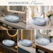 Light blue Ceramic finish oval table top wash basin, 600x400x150 mm, displayed in a modern luxury bathroom setting.