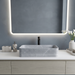 Light grey marble pattern ceramic rectangular table top wash basin 460x325x125 mm with rounded corners and horizontal ribbed exterior.
