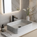 Light grey marble pattern ceramic rectangular table top wash basin 460x325x125 mm with rounded corners and horizontal ribbed exterior.