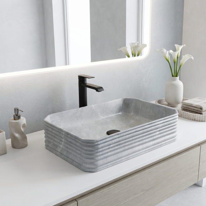 Light grey marble pattern ceramic rectangular table top wash basin 460x325x125 mm with rounded corners and horizontal ribbed exterior.
