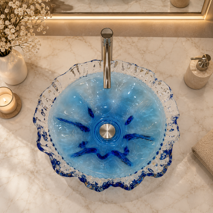 Luxury blue crystal glass table top wash basin with sculpted wavy edges, 420 × 420 × 130 mm, displayed in a modern bathroom.