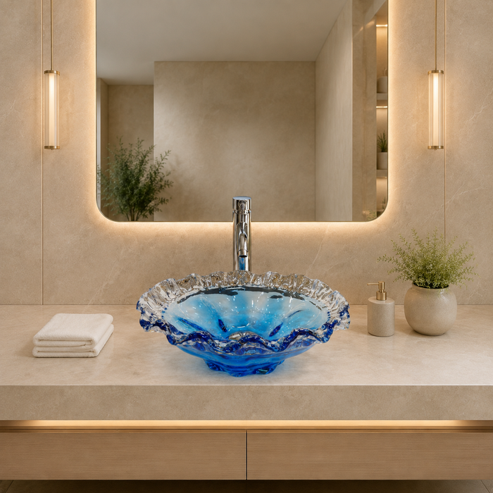 Luxury blue crystal glass table top wash basin with sculpted wavy edges, 420 × 420 × 130 mm, displayed in a modern bathroom.