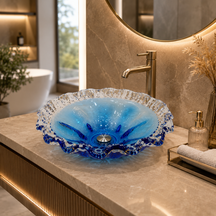 Luxury blue crystal glass table top wash basin with sculpted wavy edges, 420 × 420 × 130 mm, displayed in a modern bathroom.
