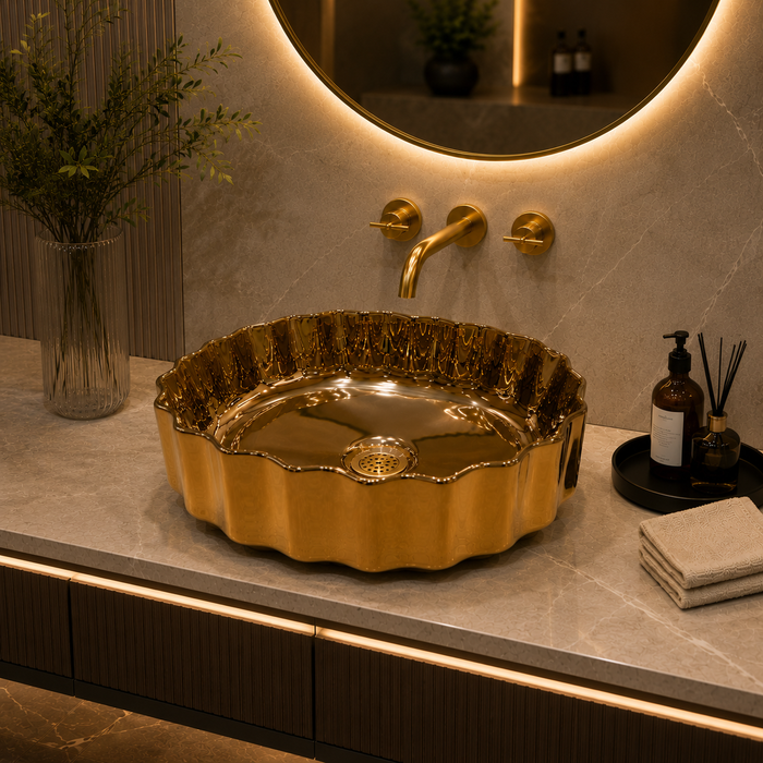 Luxury gold ceramic oval vessel wash basin with decorative scalloped exterior by Bassino