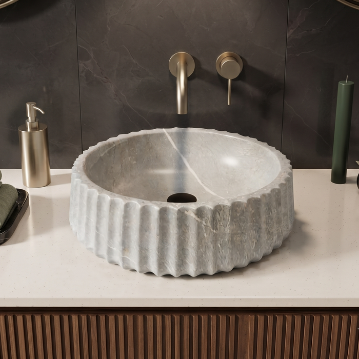 Luxury grey marble-finish round table top wash basin with white veining, fluted exterior design and 400 × 400 × 135 mm size.