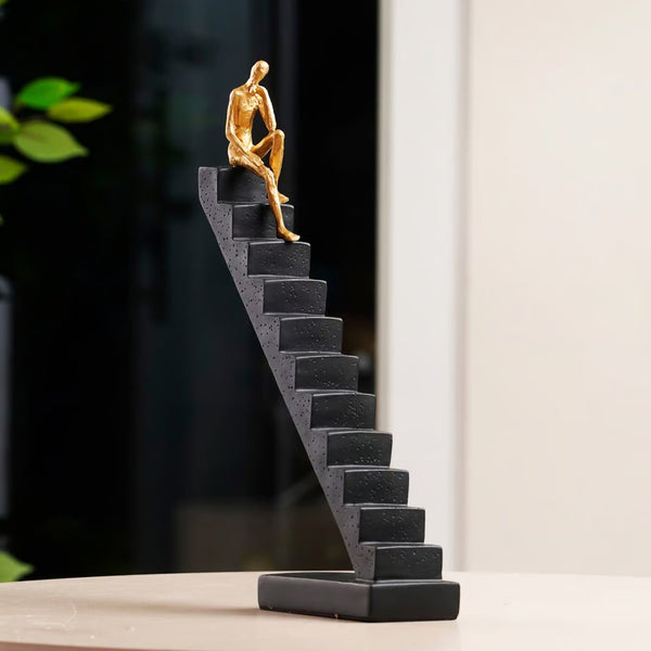 The Ascent of Reflection Resin Human on Stairs Table Showpiece (BSP-8057) L 29 W 7 H 35 CM