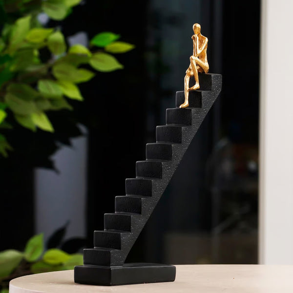 The Ascent of Reflection Resin Human on Stairs Table Showpiece (BSP-8057) L 29 W 7 H 35 CM