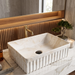 Matte ceramic table top wash basin with fluted marble design, 500 × 330 × 150 mm product dimensions